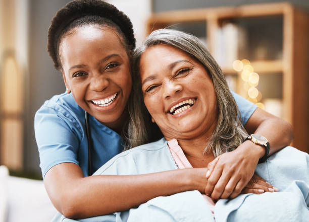Caregiver and client talking at home